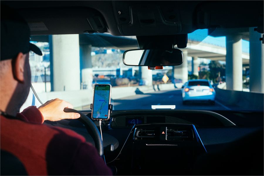 Driver at the wheel navigating a private tour